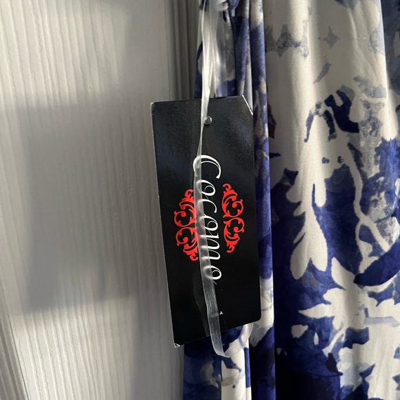 this is a silky knit polyester pull on jumpsuit by Cocomo. Medium - Picture 3 of 4